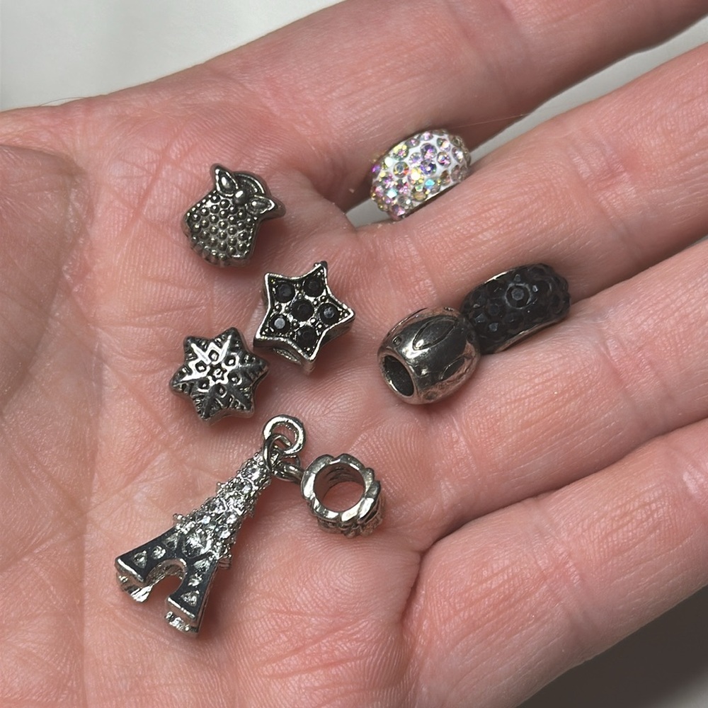 7 Charms, owl, sparkly black and iridescent snowflake, star, Eiffel Tower